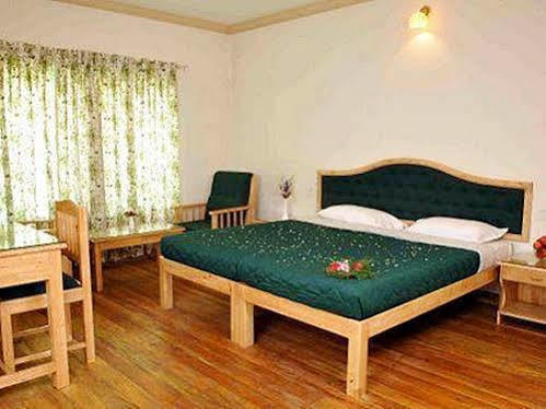 Hotel Camp Noel à Munnar Chambre photo